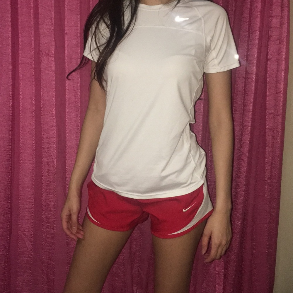 Red Nike athletic shorts